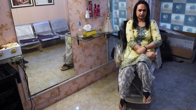 Bebo Haider at her beauty parlour in Karachi. Even when the owner of one salon first decided to take a chance on Haider, clients refused her services -- or to return her greetings. It took two years before one regular finally returned her hello, she said -- but the thaw, for that customer at least, was complete. “After that day she would not get her hair and makeup done by anybody else,” Haider told AFP, sitting in her hairdressing chair. (Rizwan Tabassum / AFP) Bebo Haider at her beauty parlour in Karachi. Even when the owner of one salon first decided to take a chance on Haider, clients refused her services -- or to return her greetings. It took two years before one regular finally returned her hello, she said -- but the thaw, for that customer at least, was complete. “After that day she would not get her hair and makeup done by anybody else,” Haider told AFP, sitting in her hairdressing chair. (Rizwan Tabassum / AFP)