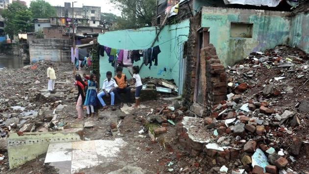 On September 25, heavy rain triggered flash flood in parts of south Pune, claiming 26 lives. (In picc) Destroyed homes at Ambil Odha near Dandekar Bridge.(HT/PHOTO)