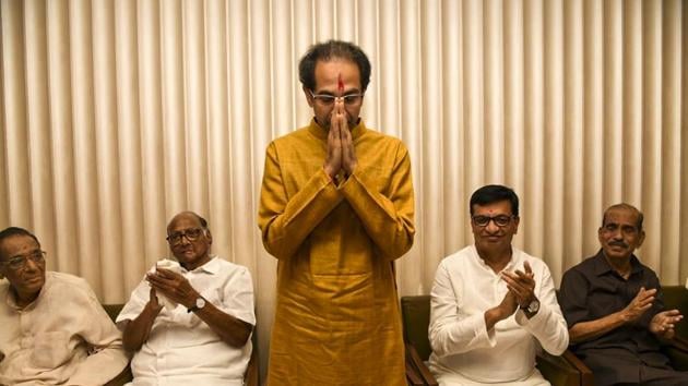 Shiv Sena chief Uddhav Thackeray gestures after he was elected as Maharashtra Chief Minister by the Maha Vikas Aghadi in the presence of NCP chief Shaead Pawar, at Trident hotel, in Mumbai, Maharashtra. (HT Photo)