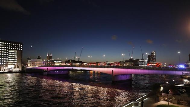 Abandoned buses and other vehicles are parked after an incident on London Bridge in London, Friday, Nov. 29, 2019. British police shot a man on London Bridge in the heart of Britain's capital on Friday after a stabbing that left several people wounded.(AP)