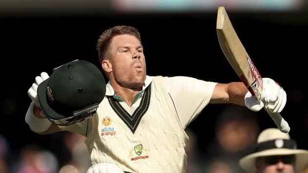 Australia's David Warner celebrates his 300 during their cricket test match against Pakistan in Adelaide.(AP)
