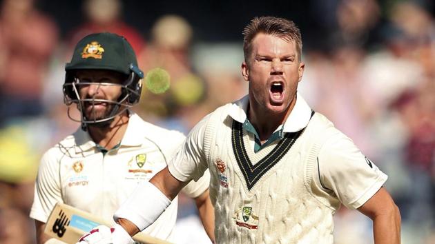 Australia's David Warner celebrates his 300 during their cricket Test.(AP)