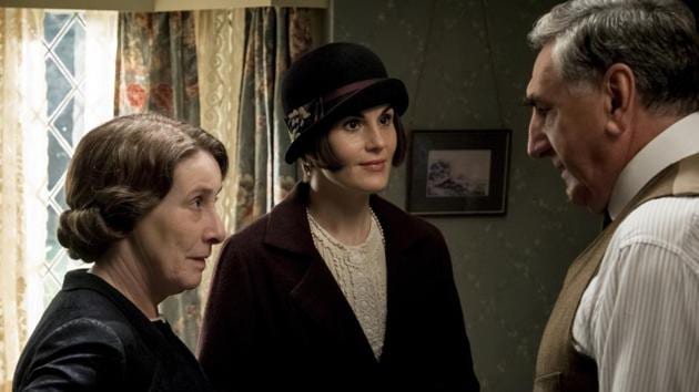 Phyllis Logan as Mrs. Hughes, Michelle Dockery as Lady Mary Talbot and Jim Carter as Mr. Carson in the film Downton Abbey.(AP)