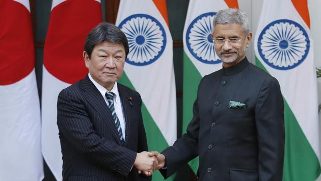 External Affairs Minister S Jaishankar greets his Japanese counterpart Toshimitsu Motegi before the start of India Japan 2+2 talks in New Delhi to boost bilateral security and defence cooperation between the two countries. (Manish Swarup / AP)