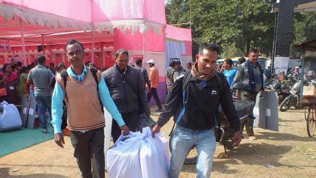 Latehar: Officials carry election material as they leave for their polling stations ahead of the Jharkhand Assembly elections, in Latehar district, Friday, Nov. 29, 2019. (PTI Photo)(PTI11_29_2019_000053A)(PTI)