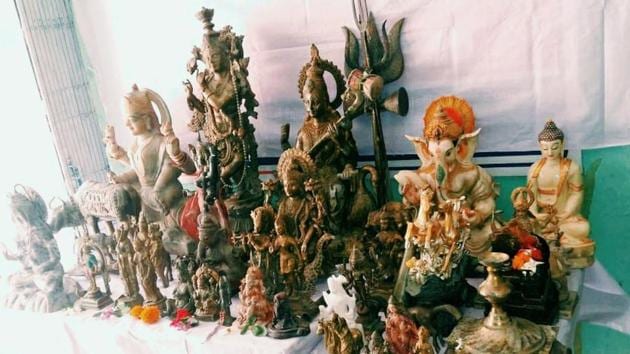 A display of idols recovered from Brahmaputra river bed from Guwahati by Assam police. (HT Photo) A display of idols recovered from Brahmaputra river bed from Guwahati by Assam police. (HT Photo)
