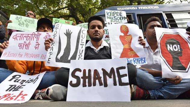 Students from different organisations hold placards to protest against the Telangana Government after the horrific rape and murder of a veterinary doctor in Hyderabad, at Parliament Street, in New Delhi. (Sanchit Khanna / HT Photo)