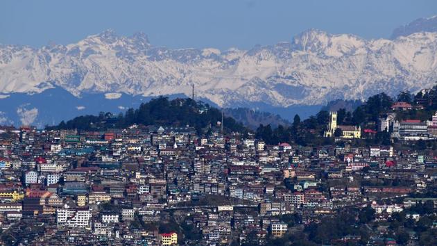 A scenic view of Shimla from Tara Devi with the snow-clad Himalayan range in the backdrop, in Himachal Pradesh. (Deepak Sansta / HT Photo)