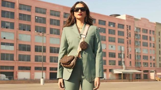 Sonam chose a pastel sea green suit while on a trip to Los Angeles with sister and stylist Rhea Kapoor. Sonam paired the 3.1 Phillip Lim outfit with a bag by Louis Vuitton that she slung across her chest. She also wore black sandals. Golden chain link earrings and black shades completed the look. (iNSTAGRAM)