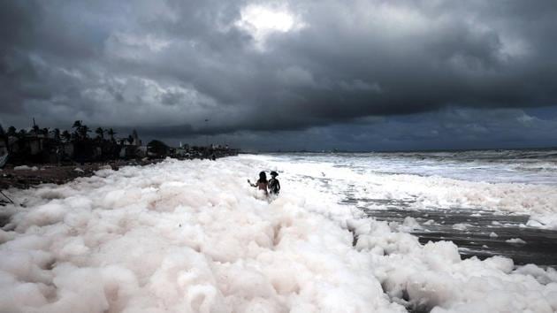 Children play in toxic foam at Marina Beach in Chennai. A menacing white foam covered one of India’s most famous beaches in Chennai for the fourth straight day on Monday, creating a new pollution hazard for the country. (ANI)