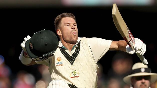 Australia's David Warner celebrates his 300 during their cricket test match against Pakistan in Adelaide(AP)