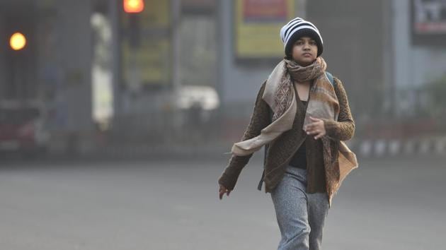 A girl is seen in warm clothes on a winter morning, at Karol Bagh, in New Delhi. (Sanchit Khanna/HT PHOTO) A girl is seen in warm clothes on a winter morning, at Karol Bagh, in New Delhi. (Sanchit Khanna/HT PHOTO)