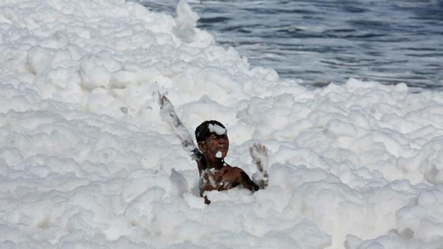 Marina Beach has been a centrepiece of Chennai life for more than a century. At weekends, tens of thousands fill the once-pristine sands where the pollution is another sign of India’s struggle to keep up with its growing economy. Experts blame heavy rain in recent days that has carried untreated sewage and phosphate down to the sea. (P Ravikumar / REUTERS)