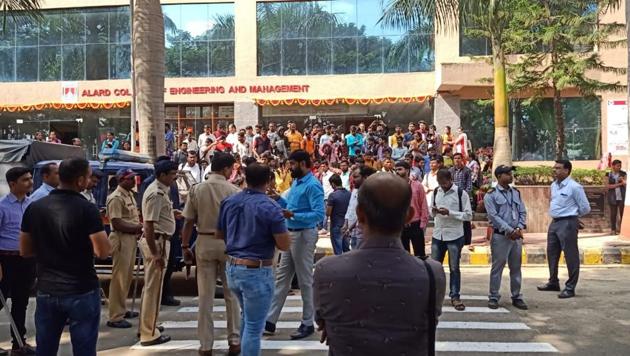 At least 300 students staged a protest outside Alard College of Engineering and Management, Hinjewadi, on Monday.(HT/PHOTO)