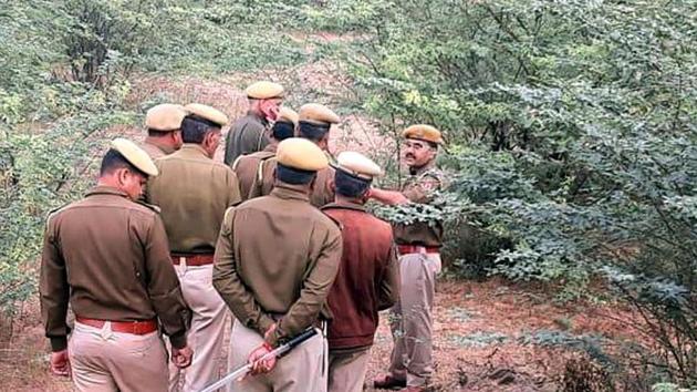 The body of Class 1 student of a government school was spotted by some villagers in a remote area of Aligarh town on Sunday. The locals then informed the police, who rushed to the spot with a forensics team. (HT Photo) The body of Class 1 student of a government school was spotted by some villagers in a remote area of Aligarh town on Sunday. The locals then informed the police, who rushed to the spot with a forensics team. (HT Photo)