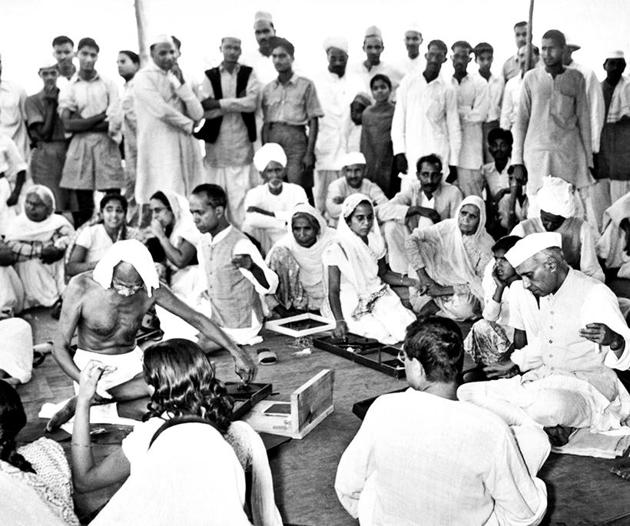 Mohandas Karamchand Gandhi and former Prime Minister Jawaharlal Nehru at a Charkha demonstration in New Delhi in April 1946. For Gandhi, the charkha was a symbol of self-reliance(Underwood Archives/ Getty)