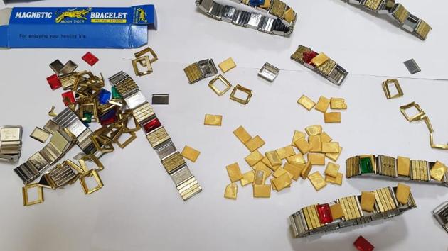 The smuggled gold was moulded in the form of wires concealed in toys and parts of bracelets. (HT Photo) The smuggled gold was moulded in the form of wires concealed in toys and parts of bracelets. (HT Photo)