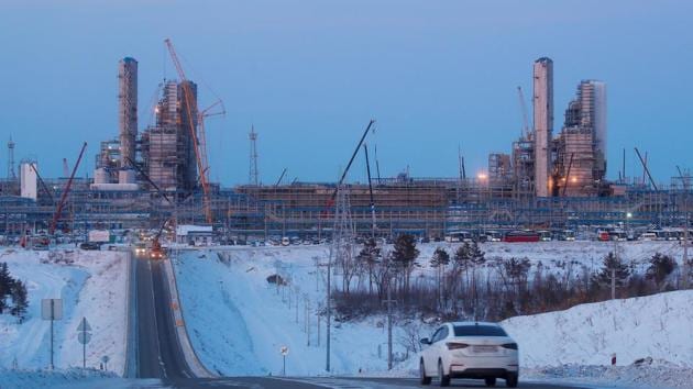 A car drives in front of facilities of Amur gas processing plant under construction, part of Gazprom's Power Of Siberia project outside the far eastern town of Svobodny, in Amur region, Russia. (Photo: Reuters) A car drives in front of facilities of Amur gas processing plant under construction, part of Gazprom's Power Of Siberia project outside the far eastern town of Svobodny, in Amur region, Russia. (Photo: Reuters)