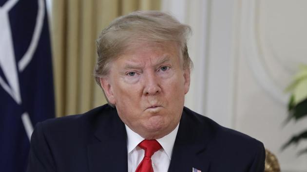U.S. President Donald Trump grimaces during a meeting with NATO Secretary General, Jens Stoltenberg at Winfield House in London on Tuesday. (AP) U.S. President Donald Trump grimaces during a meeting with NATO Secretary General, Jens Stoltenberg at Winfield House in London on Tuesday. (AP)