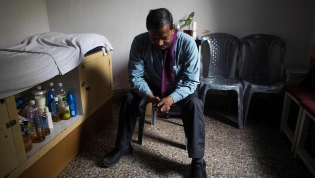 Poverty and poor access to healthcare in rural areas also contributes to the high prevalence of vision impairment in the country, experts say. Sharma -- from Bihar -- lost his sight as a teenager while working in the fields of his village. He moved to Delhi to try and get treatment but when doctors were unable to help him, he stayed on. (Xavier Galiana / AFP)