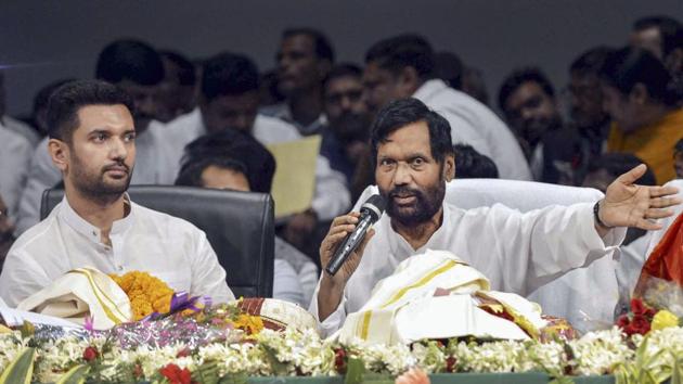 Union Food and Consumer Affairs Minister Ram Vilas Paswan addresses party workers as Lok Janshakti Party National President Chirag Paswan looks on during the party's foundation day celebration, in Patna. (Photo: PTI) Union Food and Consumer Affairs Minister Ram Vilas Paswan addresses party workers as Lok Janshakti Party National President Chirag Paswan looks on during the party's foundation day celebration, in Patna. (Photo: PTI)