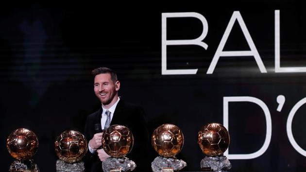 Barcelona's Lionel Messi with his six Ballon d'Or trophies. (REUTERS) Barcelona's Lionel Messi with his six Ballon d'Or trophies. (REUTERS)