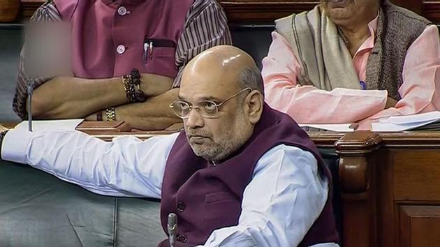 Union Home Minister Amit Shah in the Lok Sabha during the Winter Session of Parliament in New Delhi. (PTI) Union Home Minister Amit Shah in the Lok Sabha during the Winter Session of Parliament in New Delhi. (PTI)