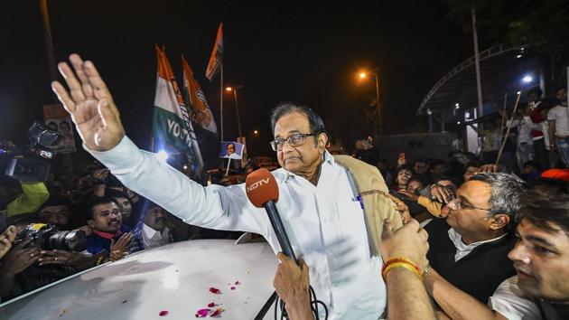 Senior Congress leader P Chidambaram waves at party workers and supporters after he was released from Tihar jail in New Delhi, Wednesday night, Dec. 4, 2019.(PTI)