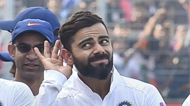 Indian team captain Virat Kohli gestures as he walks with his teammates after winning the day-night Test series against Bangladesh, at Eden Gardens in Kolkata, Sunday, Nov. 24, 2019.(PTI)