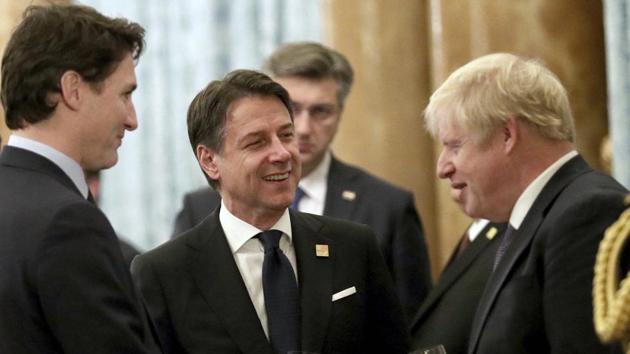 Trump is due to give another news conference, this time on his own, later Wednesday after the 29 NATO leaders hold a full three-hour closed-door summit session and issue a statement to celebrate their unity. (AP) Trump is due to give another news conference, this time on his own, later Wednesday after the 29 NATO leaders hold a full three-hour closed-door summit session and issue a statement to celebrate their unity. (AP)