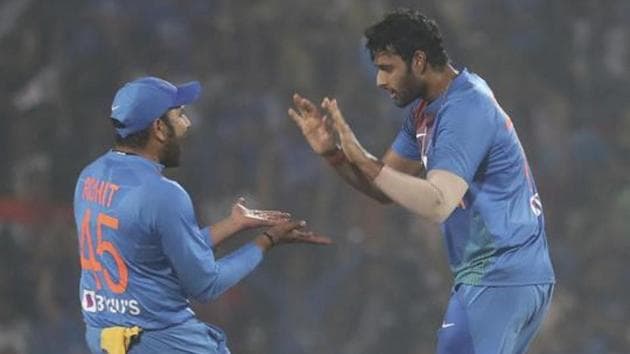 Indian players Shivam Dube, right, with Rohit Sharma celebrate the wicket of Bangladesh's Mushfiqur Rahim during their third Twenty20 international cricket match against India in Nagpur. (AP) Indian players Shivam Dube, right, with Rohit Sharma celebrate the wicket of Bangladesh's Mushfiqur Rahim during their third Twenty20 international cricket match against India in Nagpur. (AP)