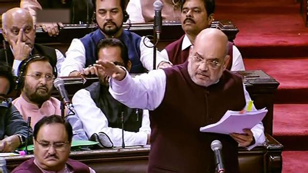 **EDS: TV GRAB** New Delhi: Union Home Minister Amit Shah speaks in the Rajya Sabha during the ongoing Winter Session of Parliament, in New Delhi(PTI)
