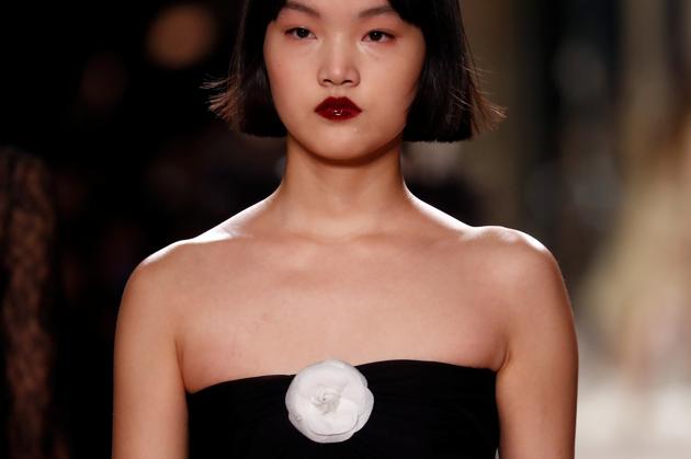 A model presents a creation during the Metiers D'Art Show for Chanel fashion house in Paris, France, December 4, 2019. REUTERS/Gonzalo Fuentes (REUTERS) A model presents a creation during the Metiers D'Art Show for Chanel fashion house in Paris, France, December 4, 2019. REUTERS/Gonzalo Fuentes (REUTERS)