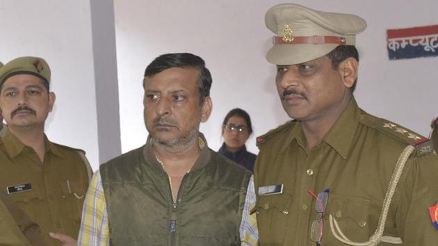 Businessman Gulshan Vasudeva's brother in law Rakesh Verma (in centre) seen in Ghaziabad Police custody on charges of allegedly abetting the former’s suicide. (Sakib Ali / HT Photo) Businessman Gulshan Vasudeva's brother in law Rakesh Verma (in centre) seen in Ghaziabad Police custody on charges of allegedly abetting the former’s suicide. (Sakib Ali / HT Photo)