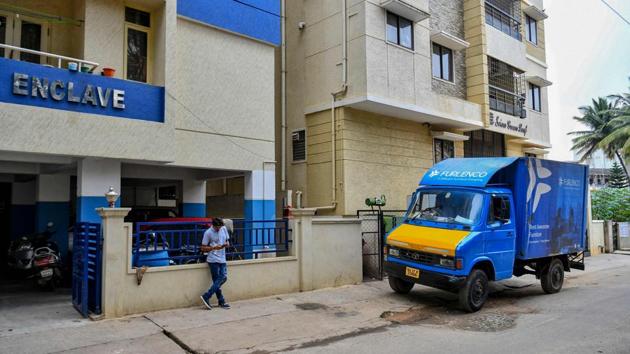 A vehicle from an online furniture and appliance rental company arrives at an apartment to deliver products to a customer. At 29, Spandan Sharma doesn’t own a flat, a car, or even a chair -- one of a growing number of Indian millennials have opted to rent everything from furniture to phones. “Millennials in my age bracket want freedom and earlier what was seen as stability is now seen as a sign of being tied down,” Sharma said. (Manjunath Kiran / AFP)