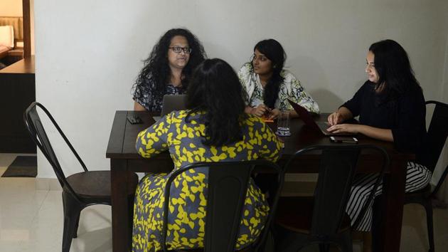 Vandita Morarka, 25, interacts with her colleagues as they sit around rented furnitures, in Mumbai. When Morarka set up her feminist non-profit One Future Collective in 2017, she rented everything and channeled the savings from not having a one-off outlay into paying salaries to her staff of 25. “This system allows me to take more risks, and in case things go south, we can wrap up without losing a large tranche of investments and begin elsewhere,” she said. (Punit Paranjpe / AFP)