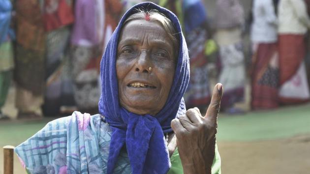 An elderly woman-voter shows her inked finger as she leaves after casting her vote at a polling station during the first phase of Jharkhand Assembly elections in Maoist-affected Lohardaga district. (PTI) An elderly woman-voter shows her inked finger as she leaves after casting her vote at a polling station during the first phase of Jharkhand Assembly elections in Maoist-affected Lohardaga district. (PTI)