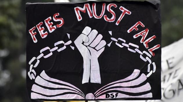 A placard is seen during a protest by students of Jawaharlal Nehru University (JNU), demanding a complete rollback of the fee hike, at Connaught Place, in New Delhi/ (Mohd Zakir/HT PHOTO) A placard is seen during a protest by students of Jawaharlal Nehru University (JNU), demanding a complete rollback of the fee hike, at Connaught Place, in New Delhi/ (Mohd Zakir/HT PHOTO)