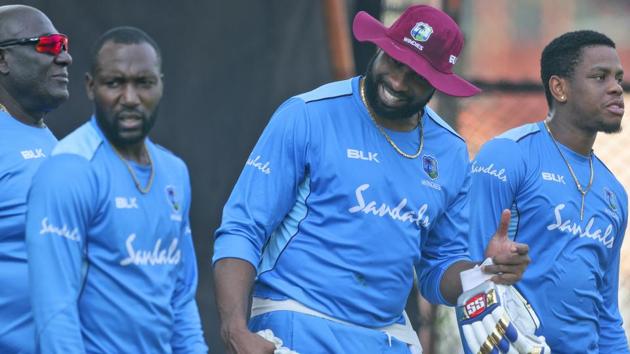 West Indies' captain Kieron Pollard, centre, attends a training session.(AP)