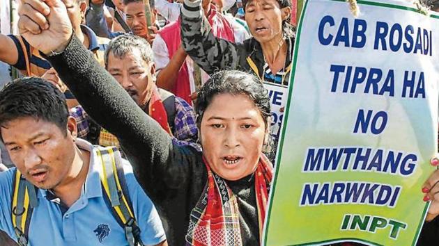 Citizens hold placards as they raise slogans during a protest against the Citizenship Amendment Bill (CAB), in Agartala(PTI)