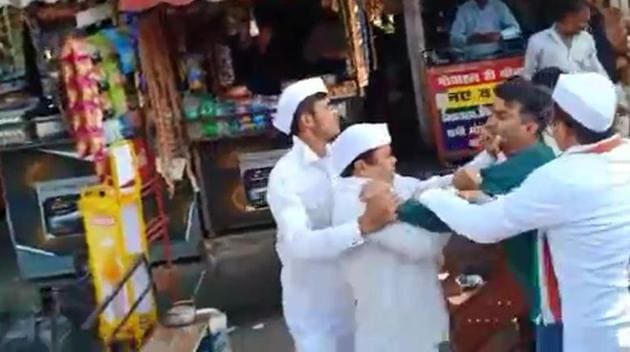 Bisht seen in a scuffle with Nainital Congress leaders during a protest against high prices of onions.(Sourced Picture) Bisht seen in a scuffle with Nainital Congress leaders during a protest against high prices of onions.(Sourced Picture)