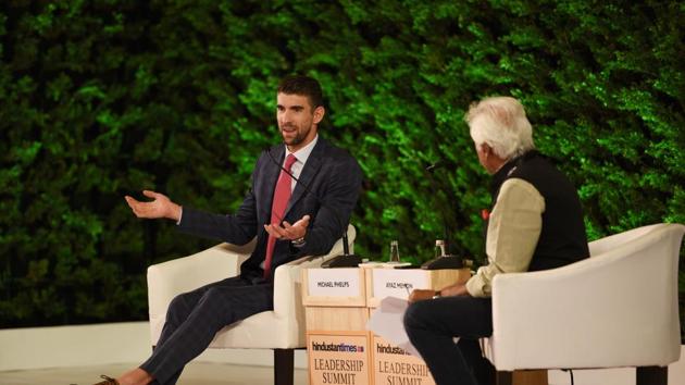 Swimming champion Michael Phelps and sports writer and journalist Ayaz Memon in conversation during the Hindustan Times Leadership Summit 2019 in New Delhi on Friday. (Ajay Aggarwal/HT PHOTO)