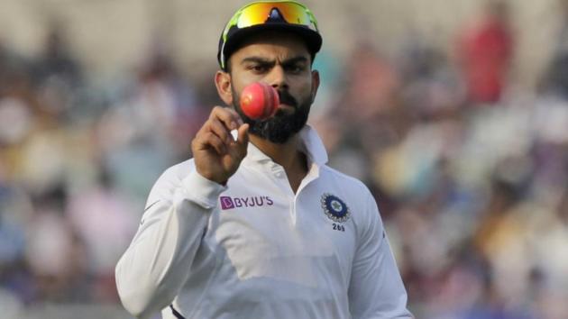 India’s captain Virat Kohli tosses a pink ball during the first day of the second test match between India and Bangladesh, in Kolkata. (AP Photo/Bikas Das) India’s captain Virat Kohli tosses a pink ball during the first day of the second test match between India and Bangladesh, in Kolkata. (AP Photo/Bikas Das)
