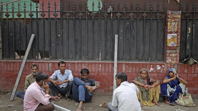 Indian daily wage laborers and construction workers wait to get hired on the outskirts of New Delhi, India. India's economy, once one of the fastest growing in the world, is braking in a blow to the labor-intensive manufacturing sector. Growth slipped to 5% in the April-June quarter, the slowest pace in six years, and many economists believe that Prime Minister Narendra Modi's signature economic policies are at least partly to blame. (AP) Indian daily wage laborers and construction workers wait to get hired on the outskirts of New Delhi, India. India's economy, once one of the fastest growing in the world, is braking in a blow to the labor-intensive manufacturing sector. Growth slipped to 5% in the April-June quarter, the slowest pace in six years, and many economists believe that Prime Minister Narendra Modi's signature economic policies are at least partly to blame. (AP)