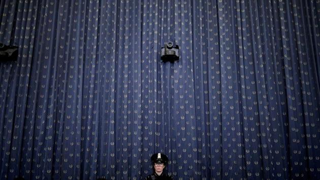 A US Capitol police officer watches from the back wall of the hearing room as the House Judiciary Committee holds their first hearing on the impeachment inquiry into US President Donald Trump on Capitol Hill in Washington. (Tom Brenner / REUTERS)