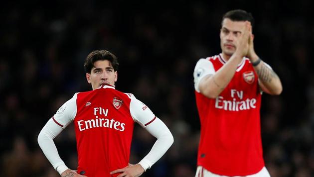 Arsenal's Hector Bellerin looks dejected after the match.(REUTERS)