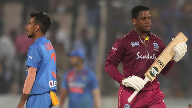 West Indies' Shimron Hetmyer leaves the field after being dismissed by Yuzvendra Chahal.(AP)
