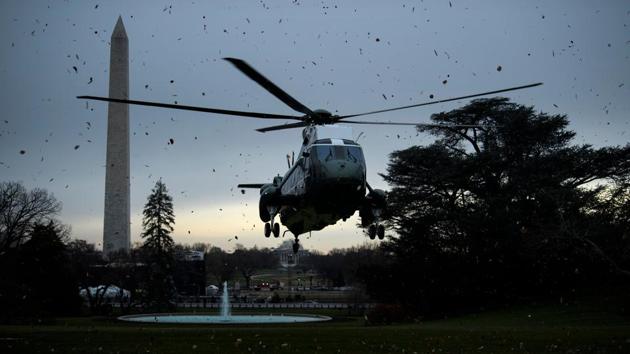 Marine One lands on the South Lawn of the White House, in Washington, DC. (Brendan Smialowski / AFP)