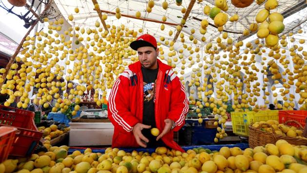 A vendor sells lemons at a market in downtown Tunis, Tunisia. (Zoubeir Souissi / REUTERS)