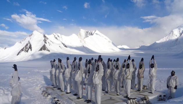 Soldiers performing yoga at Siachen Glacier, the highest battlefield in the world.(PTI FILE PHOTO)